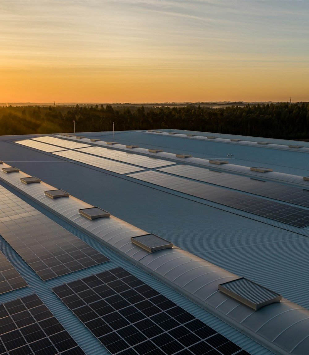 Commercial building fitted with rooftop solar panels